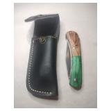 Handmade green/ tan  foldable knife in case