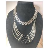 2 silver tone  necklaces