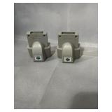 Pair of Nintendo 64 rumble paks, one has some