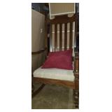 Wooden cushioned rocking chair