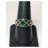 Silver green stone band ring marked 925 size 7.