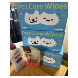 Three boxes of pet care, wipes, bottle of pet
