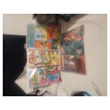 A group of comics three of the five are very old