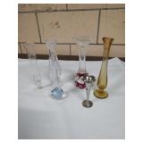 Group of six glass and metal bud vases.