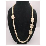 Hand carved elephant necklace 14k clasp