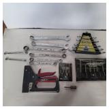 Craftsman wrenches, hole gages, and stapler