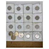 3 dollar coins, 1 JFK, 1 quarter, and 13 various
