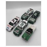 Autographed 1:24 diecast NASCARs 7 Gant & 33 Gant