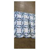 Blue and white double wedding ring pattern quilt
