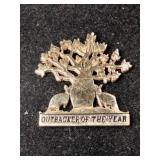 14k outbacker of the year pendant marked 14k.