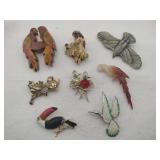 Bird brooches