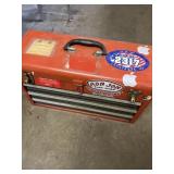 Three drawer metal tool chest with continents