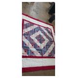 Hand made red,white,green and blue log cabin