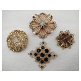 Gold tone  purple, black ,clear Stone brooches