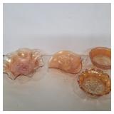 4 marigold carnival glass dishes