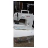 Singer model 1304 sewing machine with thread and