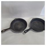 2 unmarked cast iron skillets 8in diameter