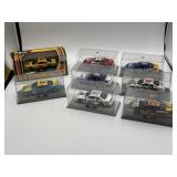 1:43 diecast NASCARs in plastic displays, 6 are