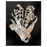 Silver Flower "May" broach Marked Sterling.