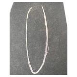 18K white gold necklace marked 750.    .165oz