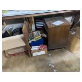 Disney VHS tapes, nightstand, toys, toaster, and