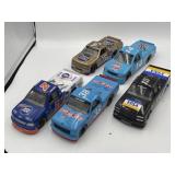 Autographed 1:24 diecast NASCAR trucks, 15 not