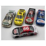 Autographed 1:24 diecast NASCAR race cars 35, 36,