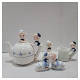 Enesco Dutch boy and girl teapot, cream and