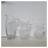Block, Atlantis, and unmarked crystal pitchers