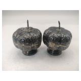 salt and pepper shakers marked Sterling.   .910oz