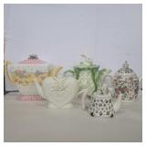 5 floral teapots and lettuce/rabbit