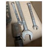Assortment of wrenches and a swivel socket