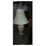Decorative ceramic table lamp with instruments