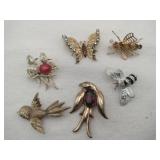 Bugs and bird brooches