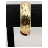 Floral gold tone etched bangle bracelet