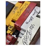 Autographed NASCAR 1/64 diecast semis & trailers