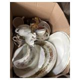 Mix of misc serving platters, animal figures, and