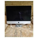 Apple computer group: monitor, disc drive, mouse,