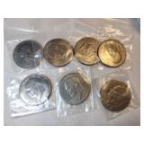 7 Eisenhower dollars mixed years