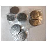 7 Eisenhower dollars mixed years