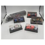 Autographed 1:43 scale diecast NASCARs & semi