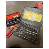 Two socket sets and burr removal tools
