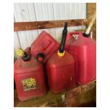 Four gas cans one is 6 gallon two or 5 gallon and