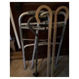 Walker and three canes