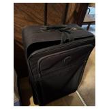 Suit Case 18" x 10" x 32" with extending handle,
