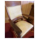 Wooden rocking chair with floral design