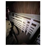 Two painted barnyard fence railings each one