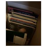Box full of vinyl albums