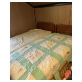 2 twin beds with mattresses