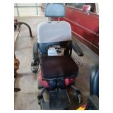Invacare electric moble Cart with charger Red